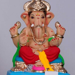 Ganpati Idol sitiing on chaurang with Aayudh