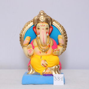 Ganpati Idol sitiing on chaurang with Aayudh and Makhar
