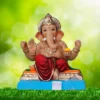 Ganesh Idol sitting on Golden Pat